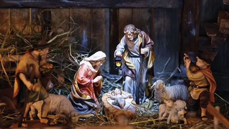 Nativity Scene Display for Christmas Traditional nativity scene with figures of Mary, Joseph, baby Jesus, shepherds, and animals.