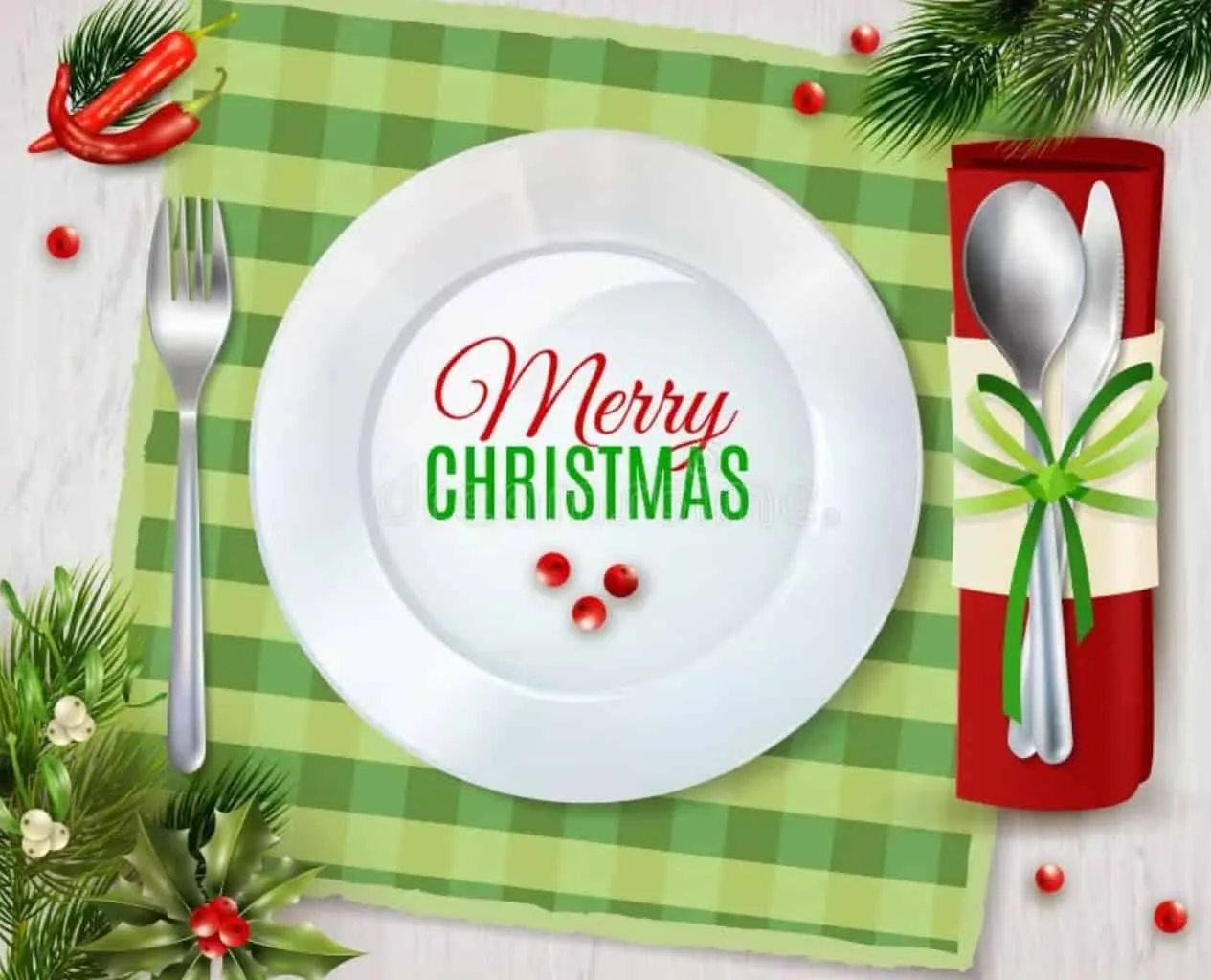 xmas Festive Christmas table setting with Merry Christmas message on plate.